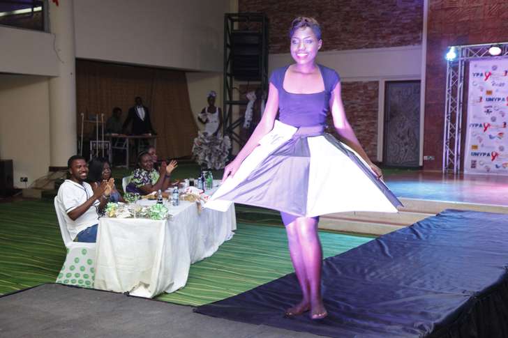 One of the AIDS Pageant contestant, wearing a dress made from an umbrella