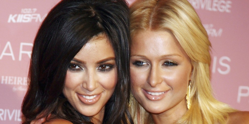 LOS ANGELES - AUGUST 18: Socialite Kim Kardashian (L) and actress/singer Paris Hilton arrive at Paris Hilton's debut cd release party at Privlage on August 18, 2006 in Los Angeles, California. (Photo by Kevin Winter/Getty Images)