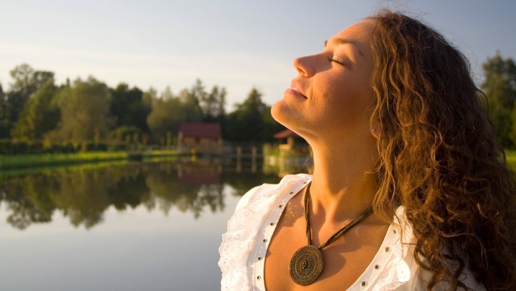 Female-Taking-A-Deep-Breath-Outside